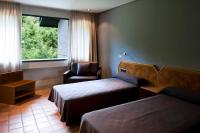 Łóżko lub łóżka w pokoju w obiekcie AS Hoteles Altube