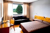 Łóżko lub łóżka w pokoju w obiekcie AS Hoteles Altube