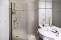 a bathroom with a shower and a sink at Best Western PLUS Elixir Grasse in Grasse