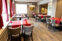 En restaurant eller et andet spisested på Hotel Daub