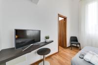 Televízia a/alebo spoločenská miestnosť v ubytovaní Corte livia Room & Breakfast