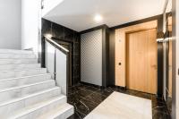 Łóżko lub łóżka w pokoju w obiekcie Exclusive Trendy Apartments