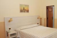Posteľ alebo postele v izbe v ubytovaní Hotel Riviera