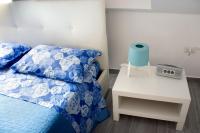 Posteľ alebo postele v izbe v ubytovaní Appartamento San Raffaele