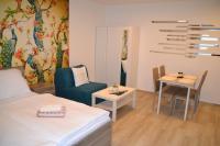 Postel nebo postele na pokoji v ubytování Slope Apartments Lipno