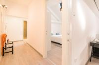 Posteľ alebo postele v izbe v ubytovaní Loft at Republic Square