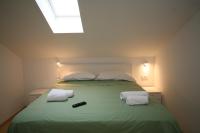 Posteľ alebo postele v izbe v ubytovaní Apartment Beljan