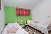 Postel nebo postele na pokoji v ubytování Apartments Daria