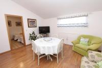 TV a/nebo společenská místnost v ubytování Apartments Daria