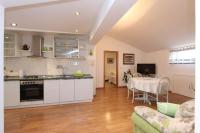 Kuchyň nebo kuchyňský kout v ubytování Apartments Daria