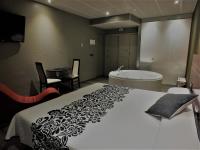 A bed or beds in a room at Motel Los Abedules