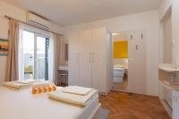 Posteľ alebo postele v izbe v ubytovaní Guest House Damir