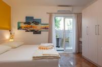 Posteľ alebo postele v izbe v ubytovaní Guest House Damir