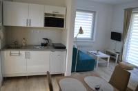 Kuchyň nebo kuchyňský kout v ubytování Slope Apartments Lipno