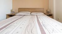 Postel nebo postele na pokoji v ubytování Apartments Kraljic