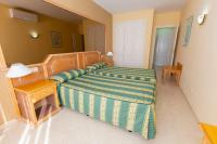 Posteľ alebo postele v izbe v ubytovaní Villa De Adeje Beach
