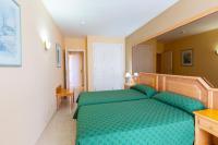 Posteľ alebo postele v izbe v ubytovaní Villa De Adeje Beach