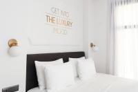 Postel nebo postele na pokoji v ubytování The Mood Luxury Rooms