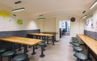 Un restaurante o sitio para comer en Station Hotel M19