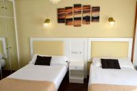 Posteľ alebo postele v izbe v ubytovaní Hotel Alda Santa Cristina