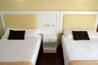 Posteľ alebo postele v izbe v ubytovaní Hotel Alda Santa Cristina