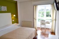 Posteľ alebo postele v izbe v ubytovaní Hotel Alda Santa Cristina