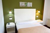 Posteľ alebo postele v izbe v ubytovaní Hotel Alda Santa Cristina