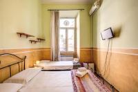 Postel nebo postele na pokoji v ubytování GuestHouse o Affittacamere Magenta Baylon Suite
