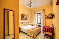 Postel nebo postele na pokoji v ubytování GuestHouse o Affittacamere Magenta Baylon Suite