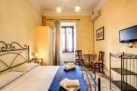 Postel nebo postele na pokoji v ubytování GuestHouse o Affittacamere Magenta Baylon Suite