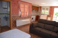 A kitchen or kitchenette at Apartamentos Matraca