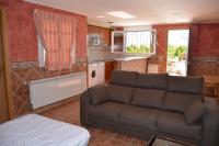A seating area at Apartamentos Matraca