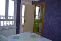 A bed or beds in a room at Apartamentos Matraca