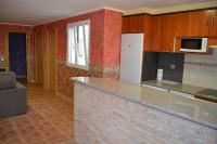 A kitchen or kitchenette at Apartamentos Matraca