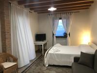 Posteľ alebo postele v izbe v ubytovaní Villa Tecla