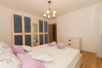 Posteľ alebo postele v izbe v ubytovaní City Central Apartments Silva