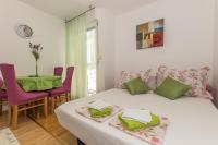 Posteľ alebo postele v izbe v ubytovaní City Central Apartments Silva