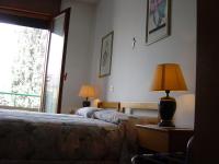 Posteľ alebo postele v izbe v ubytovaní Hotel Rizzi