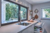 Kuchyňa alebo kuchynka v ubytovaní Casa Mia Apartments