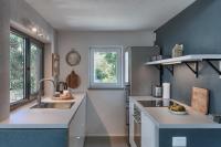 Kuchyňa alebo kuchynka v ubytovaní Casa Mia Apartments
