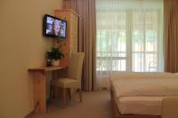 Łóżko lub łóżka w pokoju w obiekcie Hotel Kraftquelle Schlossblick
