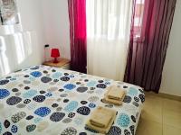Postel nebo postele na pokoji v ubytování Apartment Aguila Real