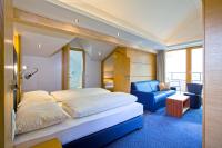 Łóżko lub łóżka w pokoju w obiekcie Hotel Lukas