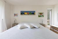 Postel nebo postele na pokoji v ubytování Villa Carlita by Perle di Puglia