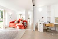 A seating area at HelloChalet - Maison Rue de la Neige - Family Ski Holiday walking distance skirun and gondola