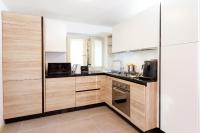 A kitchen or kitchenette at HelloChalet - Maison Rue de la Neige - Family Ski Holiday walking distance skirun and gondola