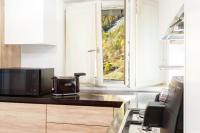 A seating area at HelloChalet - Maison Rue de la Neige - Family Ski Holiday walking distance skirun and gondola