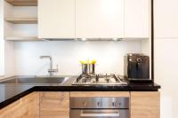 A kitchen or kitchenette at HelloChalet - Maison Rue de la Neige - Family Ski Holiday walking distance skirun and gondola