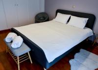 Postel nebo postele na pokoji v ubytování DARSISS 1 - Museum Apartment