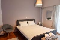 Postel nebo postele na pokoji v ubytování DARSISS 1 - Museum Apartment